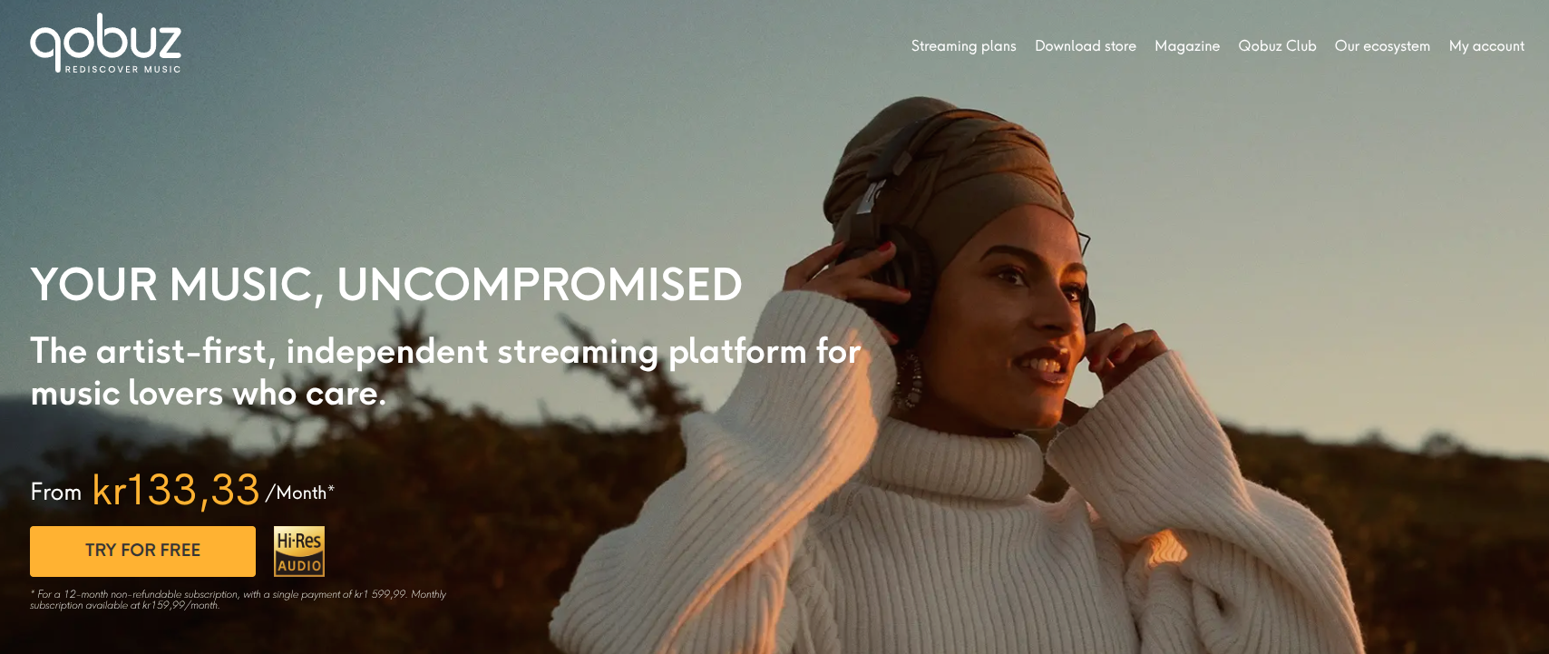 Screenshot of the Qobuz homepage showing a woman enjoying music in the sunset.